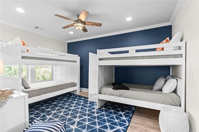 Nestled among palms on Island Moorings' coveted *Shady Side,* on Palmilla Beach Golf Club in Texas - for sale on GolfHomes.com, golf home, golf lot