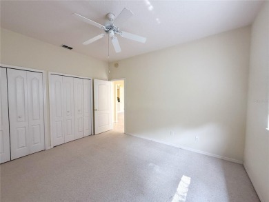 Welcome to this beautifully updated St. Clair model, perfectly on Kings Ridge Golf Club in Florida - for sale on GolfHomes.com, golf home, golf lot