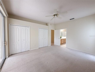 Welcome to this beautifully updated St. Clair model, perfectly on Kings Ridge Golf Club in Florida - for sale on GolfHomes.com, golf home, golf lot