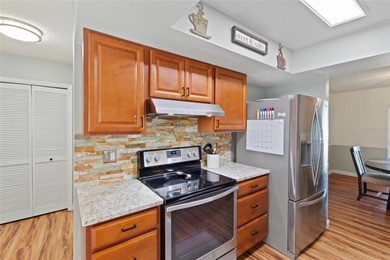 Under contract-accepting backup offers. This move-in-ready home on Bloomingdale Golfers Club in Florida - for sale on GolfHomes.com, golf home, golf lot