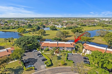 GORGEOUS WATERFRONT CONDO | COMPLETELY REMODELED | FIRST FLOOR on Boca Lago Golf and Country Club in Florida - for sale on GolfHomes.com, golf home, golf lot