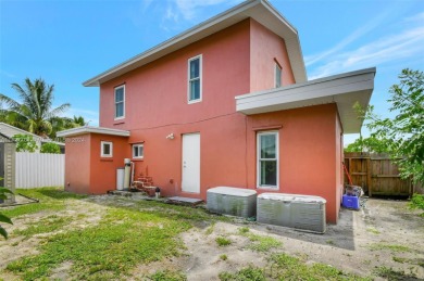 Enjoy this 2-story home built in 2015. No HOA Community. This on Trump International Golf Club West Palm Beach in Florida - for sale on GolfHomes.com, golf home, golf lot