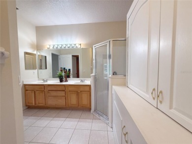 Welcome to this beautifully updated St. Clair model, perfectly on Kings Ridge Golf Club in Florida - for sale on GolfHomes.com, golf home, golf lot