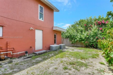 Enjoy this 2-story home built in 2015. No HOA Community. This on Trump International Golf Club West Palm Beach in Florida - for sale on GolfHomes.com, golf home, golf lot