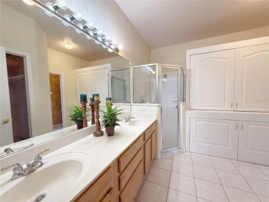 Welcome to this beautifully updated St. Clair model, perfectly on Kings Ridge Golf Club in Florida - for sale on GolfHomes.com, golf home, golf lot