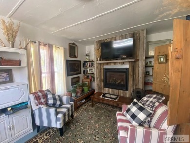 Attractive home in a great location in Mackay, ID. This charming on River Park Golf Course and RV Pk in Idaho - for sale on GolfHomes.com, golf home, golf lot