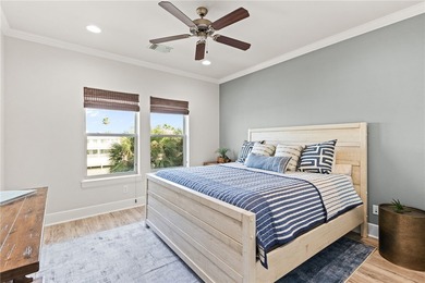 Nestled among palms on Island Moorings' coveted *Shady Side,* on Palmilla Beach Golf Club in Texas - for sale on GolfHomes.com, golf home, golf lot