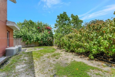 Enjoy this 2-story home built in 2015. No HOA Community. This on Trump International Golf Club West Palm Beach in Florida - for sale on GolfHomes.com, golf home, golf lot