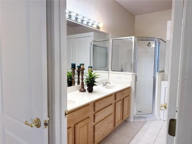Welcome to this beautifully updated St. Clair model, perfectly on Kings Ridge Golf Club in Florida - for sale on GolfHomes.com, golf home, golf lot