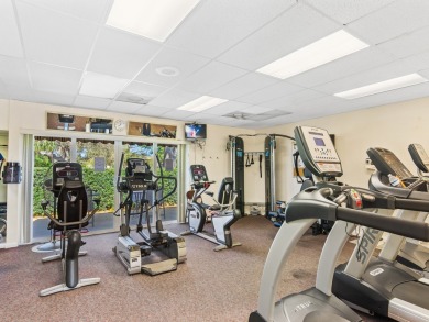 Welcome to this beautifully renovated, turn key, first-floor on The American Golf Club in Florida - for sale on GolfHomes.com, golf home, golf lot