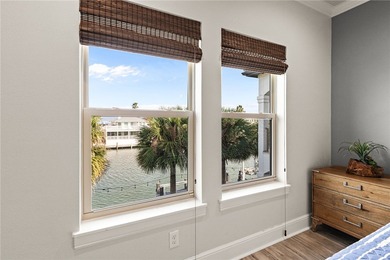 Nestled among palms on Island Moorings' coveted *Shady Side,* on Palmilla Beach Golf Club in Texas - for sale on GolfHomes.com, golf home, golf lot