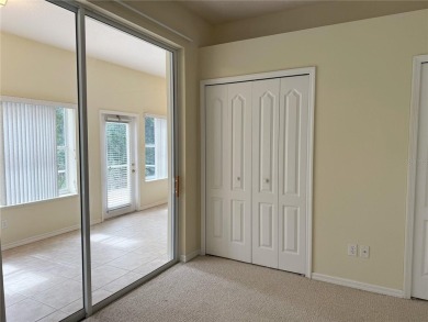 Welcome to this beautifully updated St. Clair model, perfectly on Kings Ridge Golf Club in Florida - for sale on GolfHomes.com, golf home, golf lot