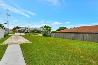 Enjoy this 2-story home built in 2015. No HOA Community. This on Trump International Golf Club West Palm Beach in Florida - for sale on GolfHomes.com, golf home, golf lot