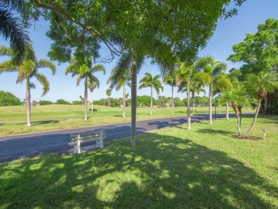 Welcome to this beautifully renovated, turn key, first-floor on The American Golf Club in Florida - for sale on GolfHomes.com, golf home, golf lot