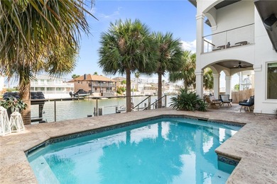 Nestled among palms on Island Moorings' coveted *Shady Side,* on Palmilla Beach Golf Club in Texas - for sale on GolfHomes.com, golf home, golf lot