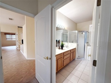Welcome to this beautifully updated St. Clair model, perfectly on Kings Ridge Golf Club in Florida - for sale on GolfHomes.com, golf home, golf lot