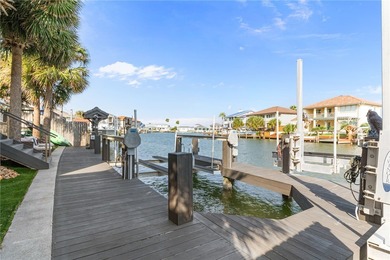 Nestled among palms on Island Moorings' coveted *Shady Side,* on Palmilla Beach Golf Club in Texas - for sale on GolfHomes.com, golf home, golf lot