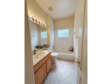 Welcome to this beautifully updated St. Clair model, perfectly on Kings Ridge Golf Club in Florida - for sale on GolfHomes.com, golf home, golf lot
