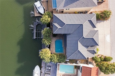 Nestled among palms on Island Moorings' coveted *Shady Side,* on Palmilla Beach Golf Club in Texas - for sale on GolfHomes.com, golf home, golf lot