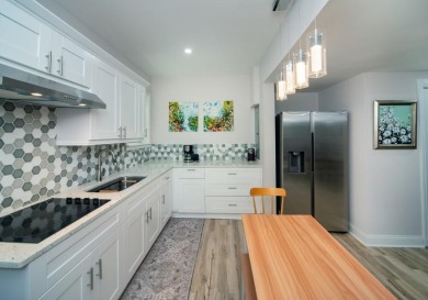 The basement was fully finished and the Kitchen renovated in on Trophy Club of Apalachee in Georgia - for sale on GolfHomes.com, golf home, golf lot