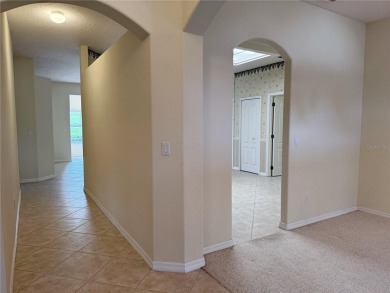 Welcome to this beautifully updated St. Clair model, perfectly on Kings Ridge Golf Club in Florida - for sale on GolfHomes.com, golf home, golf lot