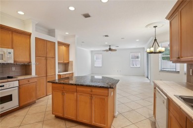 This wonderful single family home has 5 bedrooms & 3 baths w/ a on The Links At Madison Green in Florida - for sale on GolfHomes.com, golf home, golf lot