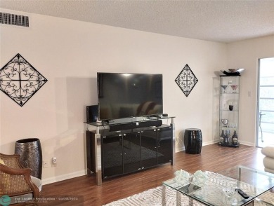 IMMACULATE FURNISHED TURN-KEY 2BR/2BTH! OPEN KITCHEN CONCEPT on Wynmoor Golf Course in Florida - for sale on GolfHomes.com, golf home, golf lot