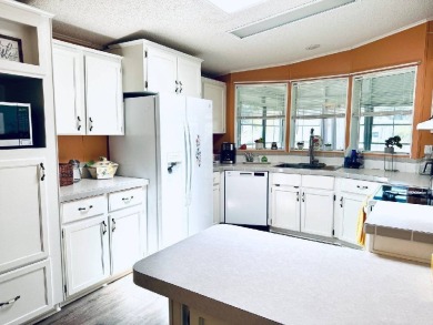 Stunning Retreat in Prestigious Award-Winning 55+ Community on Schalamar Creek Golf and Country Club in Florida - for sale on GolfHomes.com, golf home, golf lot