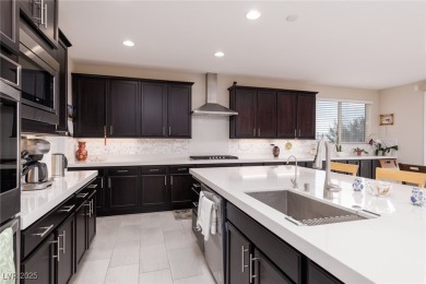 This impressive two-story home is nestled in the prestigious on Rhodes Ranch Golf Club in Nevada - for sale on GolfHomes.com, golf home, golf lot