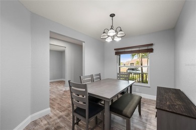 Soft views of surrounding trees create a tranquil backdrop for on Bobcat Trail Golf Club in Florida - for sale on GolfHomes.com, golf home, golf lot