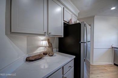 Discover modern comfort and golf course living in this on Bay Pointe Golf and Resort in Mississippi - for sale on GolfHomes.com, golf home, golf lot