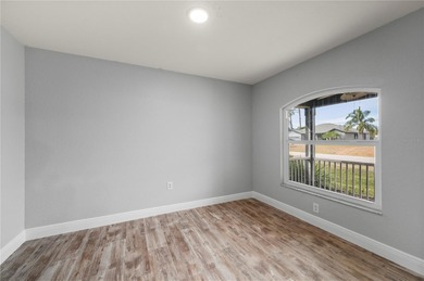 Soft views of surrounding trees create a tranquil backdrop for on Bobcat Trail Golf Club in Florida - for sale on GolfHomes.com, golf home, golf lot