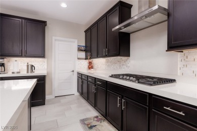 This impressive two-story home is nestled in the prestigious on Rhodes Ranch Golf Club in Nevada - for sale on GolfHomes.com, golf home, golf lot