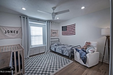 Discover modern comfort and golf course living in this on Bay Pointe Golf and Resort in Mississippi - for sale on GolfHomes.com, golf home, golf lot