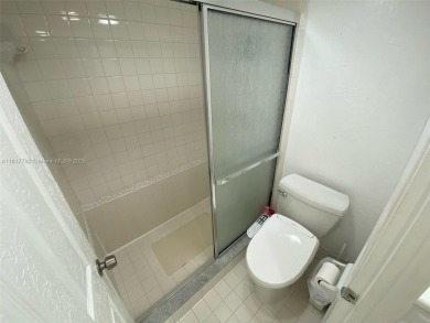 WATER VIEW! 2 BED, 2 BATH GROUND FLOOR UNIT. WASHER AND DRYER on Inverrary Country Club in Florida - for sale on GolfHomes.com, golf home, golf lot
