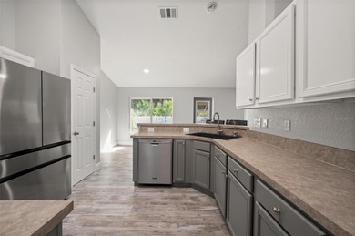 Soft views of surrounding trees create a tranquil backdrop for on Bobcat Trail Golf Club in Florida - for sale on GolfHomes.com, golf home, golf lot