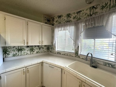 Here's a home that has enormous potential. Great open floor plan on The Meadows At Countrywood in Florida - for sale on GolfHomes.com, golf home, golf lot
