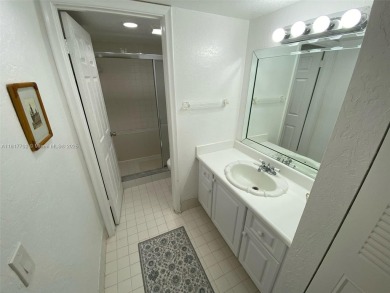WATER VIEW! 2 BED, 2 BATH GROUND FLOOR UNIT. WASHER AND DRYER on Inverrary Country Club in Florida - for sale on GolfHomes.com, golf home, golf lot