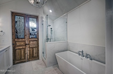 Discover modern comfort and golf course living in this on Bay Pointe Golf and Resort in Mississippi - for sale on GolfHomes.com, golf home, golf lot