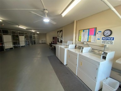 WATER VIEW! 2 BED, 2 BATH GROUND FLOOR UNIT. WASHER AND DRYER on Inverrary Country Club in Florida - for sale on GolfHomes.com, golf home, golf lot