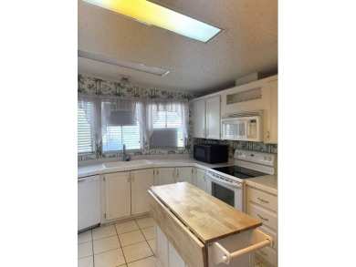 Here's a home that has enormous potential. Great open floor plan on The Meadows At Countrywood in Florida - for sale on GolfHomes.com, golf home, golf lot