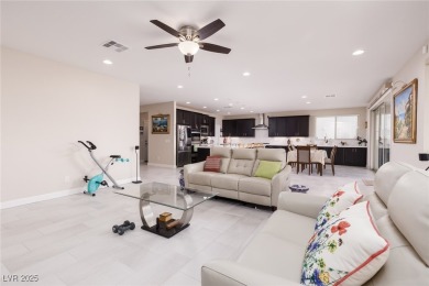 This impressive two-story home is nestled in the prestigious on Rhodes Ranch Golf Club in Nevada - for sale on GolfHomes.com, golf home, golf lot