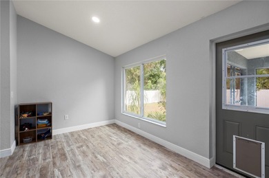 Soft views of surrounding trees create a tranquil backdrop for on Bobcat Trail Golf Club in Florida - for sale on GolfHomes.com, golf home, golf lot