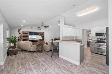 Soft views of surrounding trees create a tranquil backdrop for on Bobcat Trail Golf Club in Florida - for sale on GolfHomes.com, golf home, golf lot