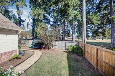 Discover modern comfort and golf course living in this on Bay Pointe Golf and Resort in Mississippi - for sale on GolfHomes.com, golf home, golf lot
