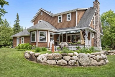 Custom designed home in a private neighborhood Stonebridge on Charlevoix Golf and Country Club in Michigan - for sale on GolfHomes.com, golf home, golf lot
