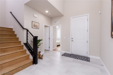 This impressive two-story home is nestled in the prestigious on Rhodes Ranch Golf Club in Nevada - for sale on GolfHomes.com, golf home, golf lot