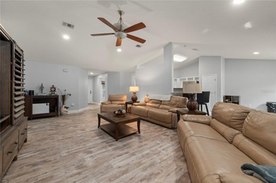 Soft views of surrounding trees create a tranquil backdrop for on Bobcat Trail Golf Club in Florida - for sale on GolfHomes.com, golf home, golf lot