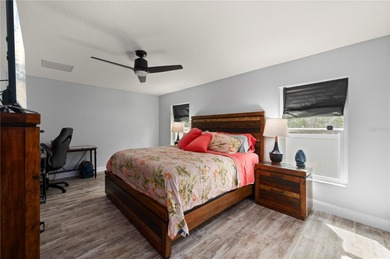 Soft views of surrounding trees create a tranquil backdrop for on Bobcat Trail Golf Club in Florida - for sale on GolfHomes.com, golf home, golf lot