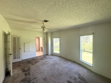 Here's a home that has enormous potential. Great open floor plan on The Meadows At Countrywood in Florida - for sale on GolfHomes.com, golf home, golf lot